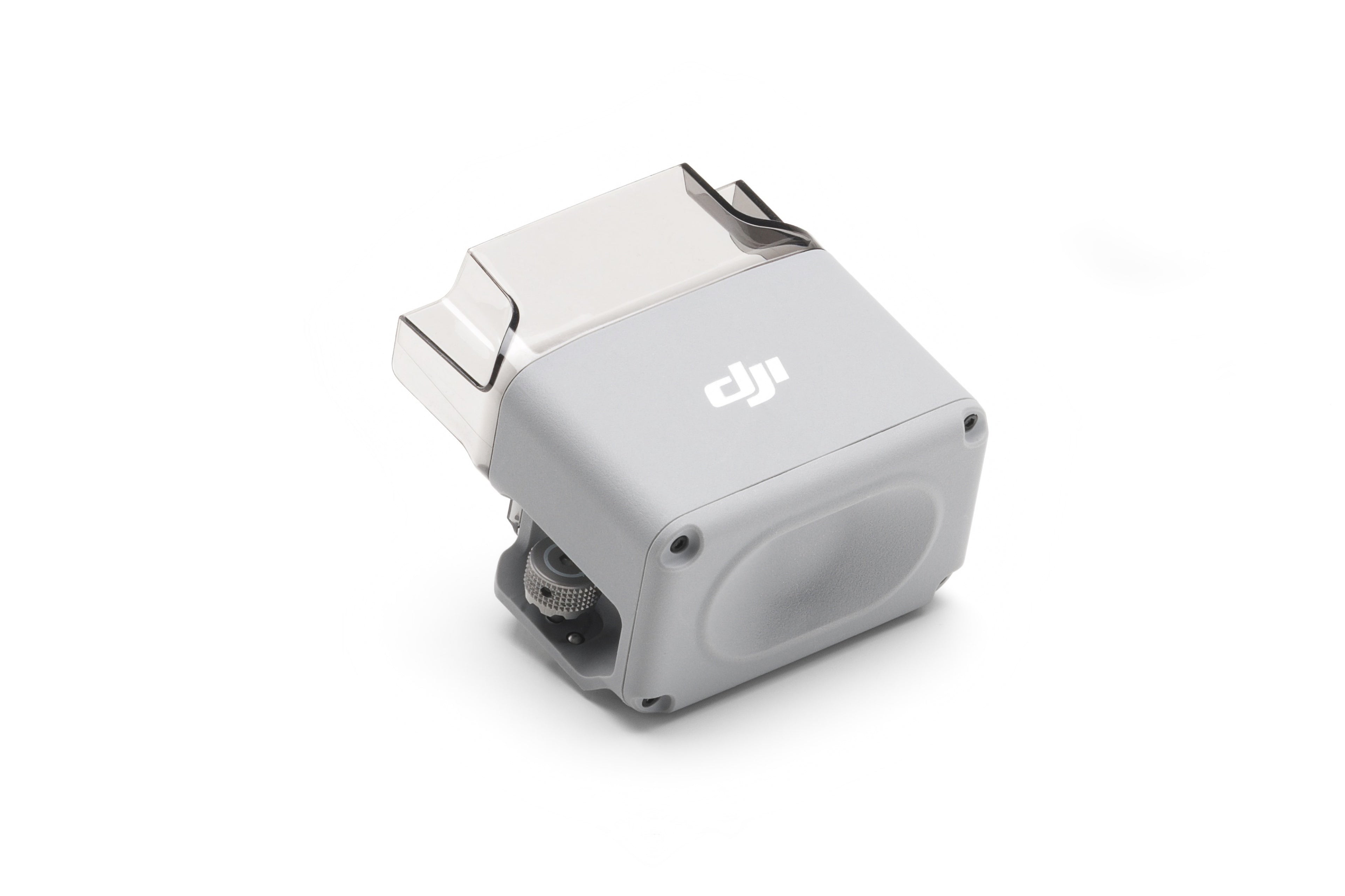 Ein kompaktes, graues Kameramodul von DJI Enterprise verfügt über eine glänzende, transparente Abdeckung und das DJI-Logo auf der Oberseite. Das rechteckige Modul mit abgerundeten Kanten zeigt die internen Komponenten und bietet Echtzeitübertragung. DJI AS1-Lautsprecher für die Matrice 4-Serie – M4E, M4T.