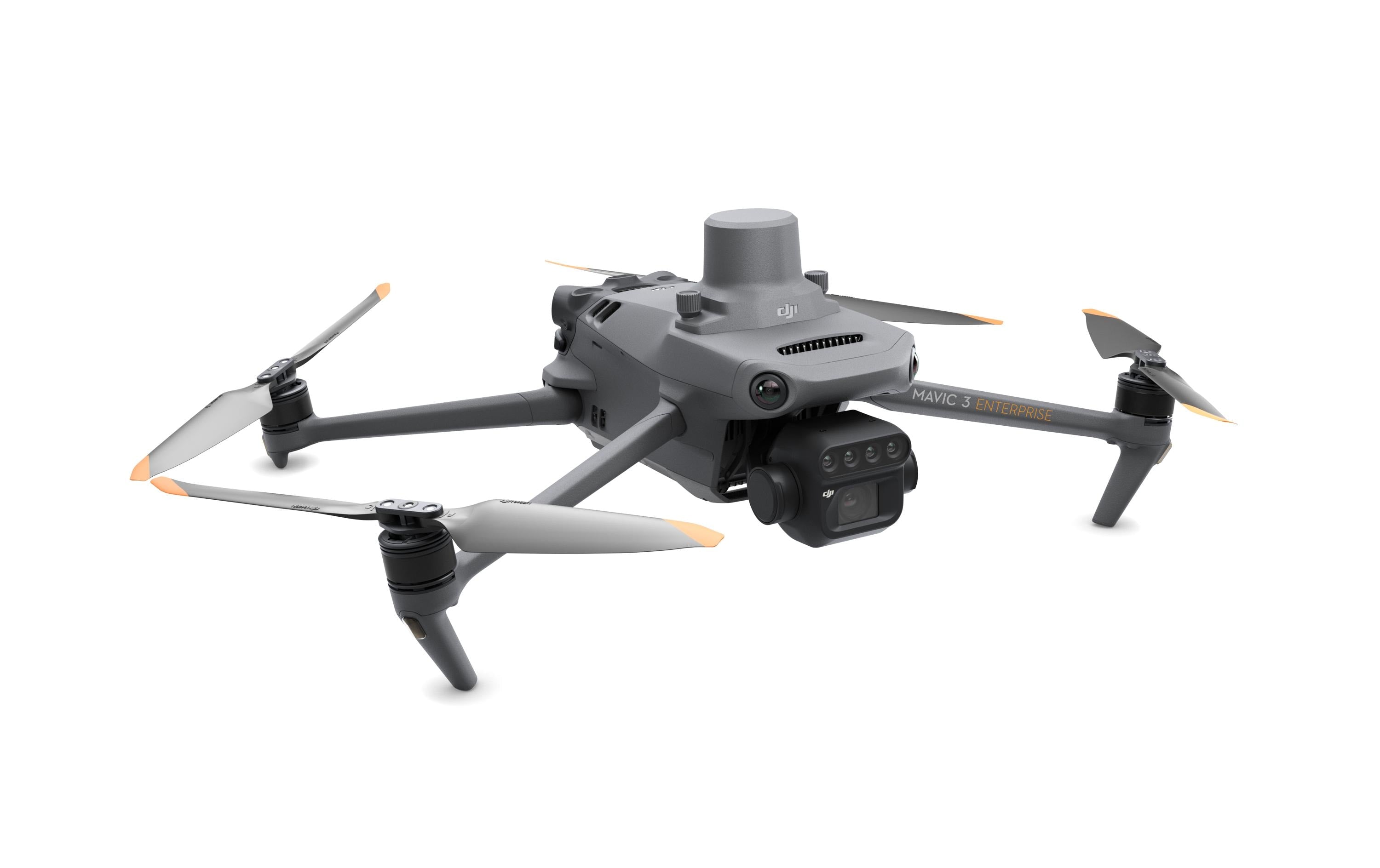 Der DJI Enterprise Multikopter Mavic 3 Multispectral – M3M (EU/C2) von DJI ist ein eleganter, grauer Quadrocopter mit sichtbarer Kameraausrüstung für den professionellen Einsatz in der Landwirtschaft und verfügt über ein multispektrales Bildgebungssystem. Sein kompaktes, modernes Design sticht vor dem schlichten weißen Hintergrund hervor.