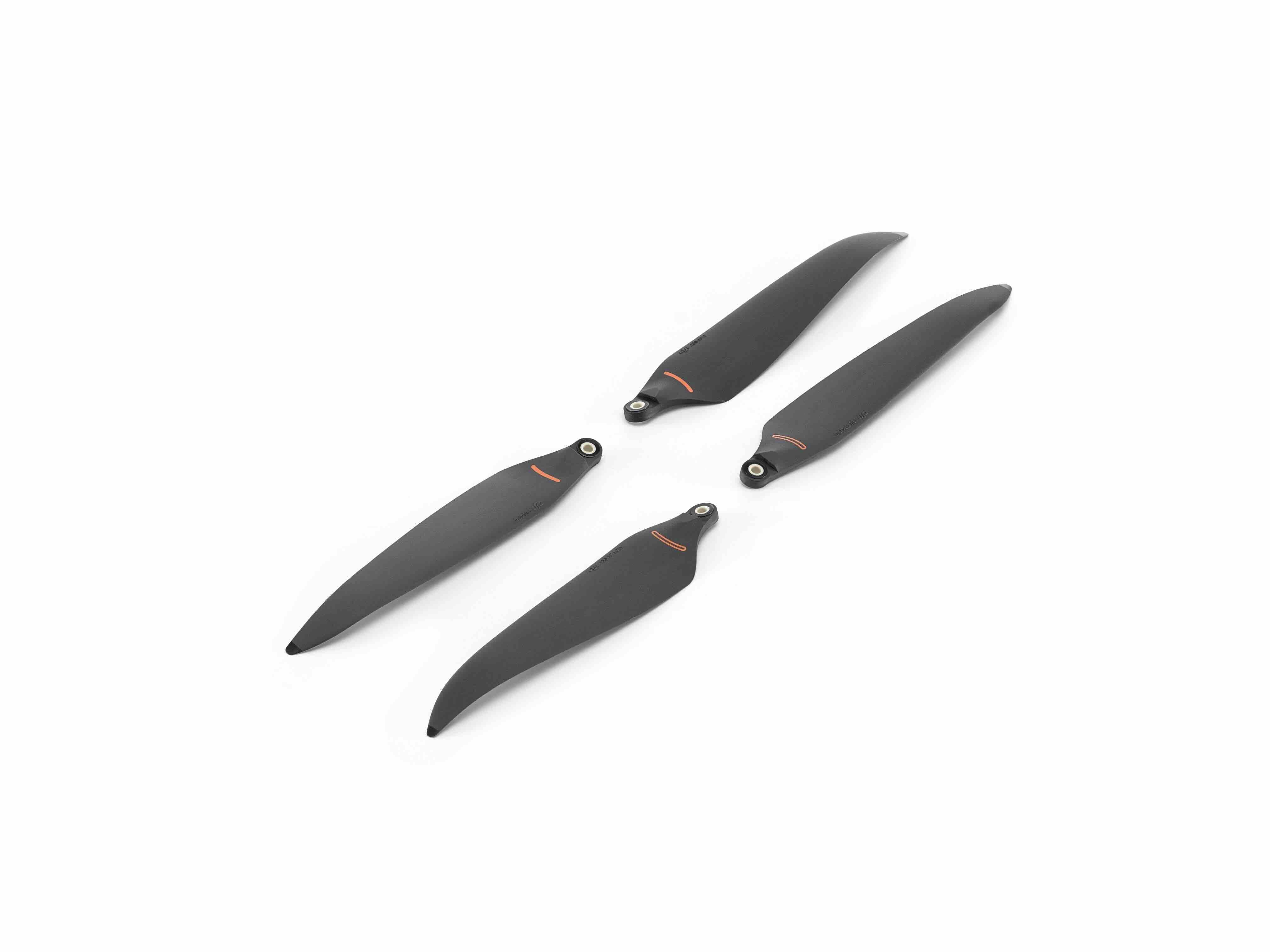 Vier DJI Enterprise Low-Noise Anti-Ice Propeller (1 Paar) für Matrice 4D/4TD mit schwarzen Blättern und orangefarbenen Spitzen sind auf weißem Hintergrund abgebildet – zwei nach oben und zwei nach unten, um beide Seiten freizugeben. Ideal für Winterinspektionen.