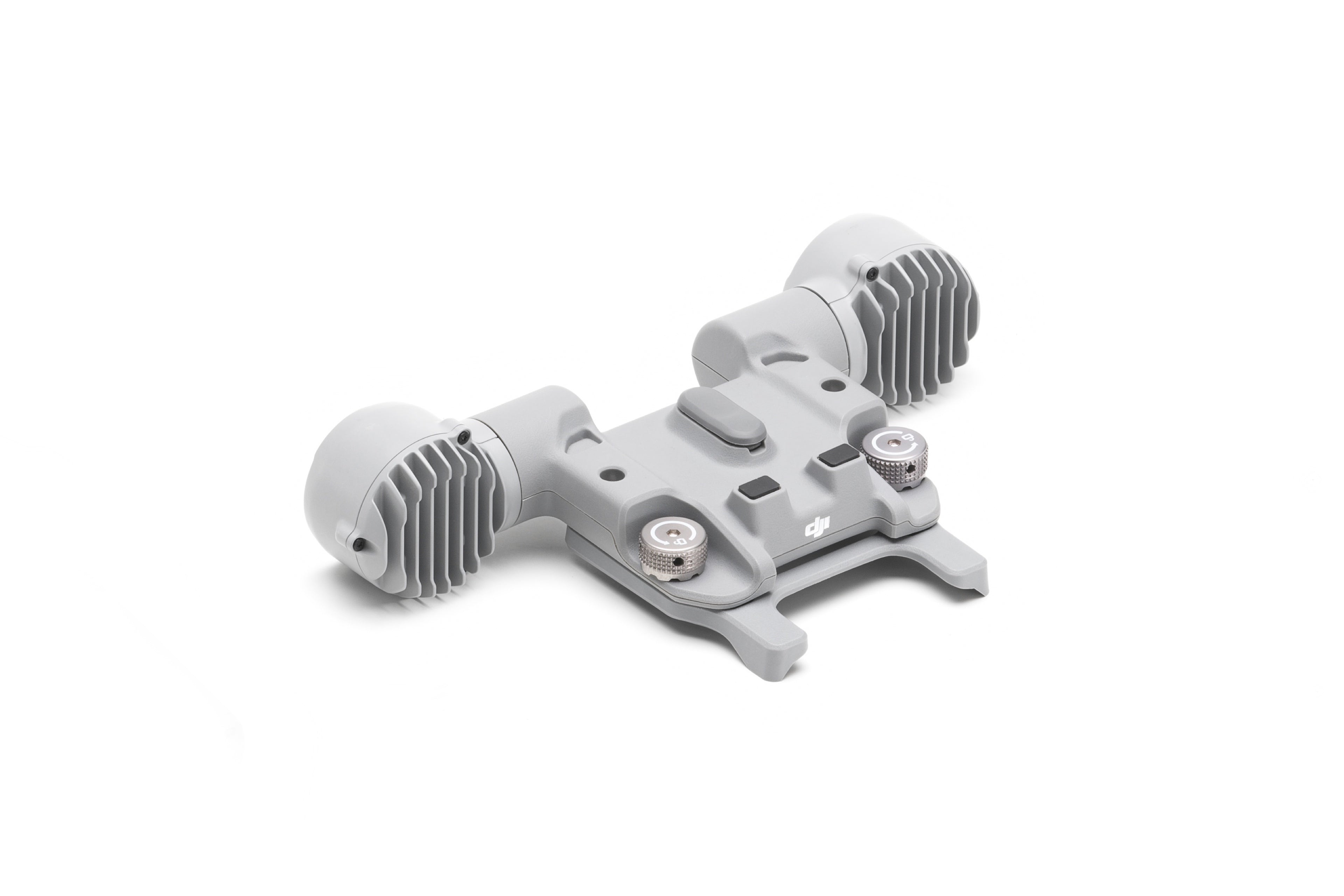 Der DJI AL1 Scheinwerfer ist ein kompaktes, graues Drohnenzubehör für die M4-Serie von DJI Enterprise. Er verfügt über zwei runde Abschnitte auf jeder Seite, eine zentrale Plattform mit einem kleinen Knopf und lüftungsähnliche Details für optimale Luftzirkulation bzw. Kühlung.