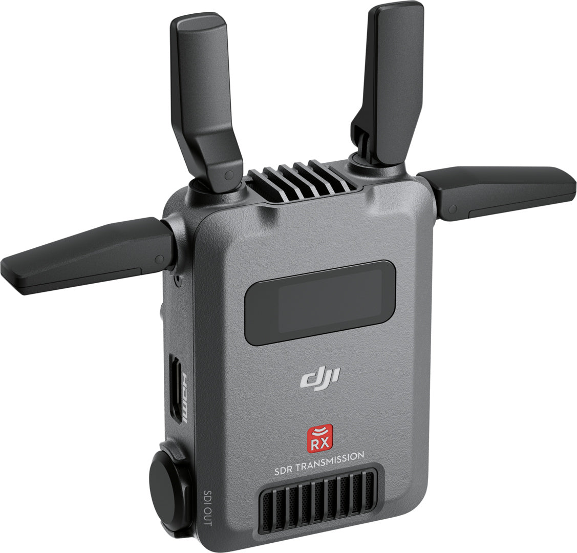Der DJI Pro Digitale Bildübertragung RX – DJI SDR Transmission Receiver RX verfügt über vier einstellbare Antennen, ein kleines Display, Belüftungsöffnungen und die Beschriftung „SDR Transmission RX“ und ermöglicht stabiles 1080p FHD-Streaming bis zu 3 km mit einem kompatiblen TX.