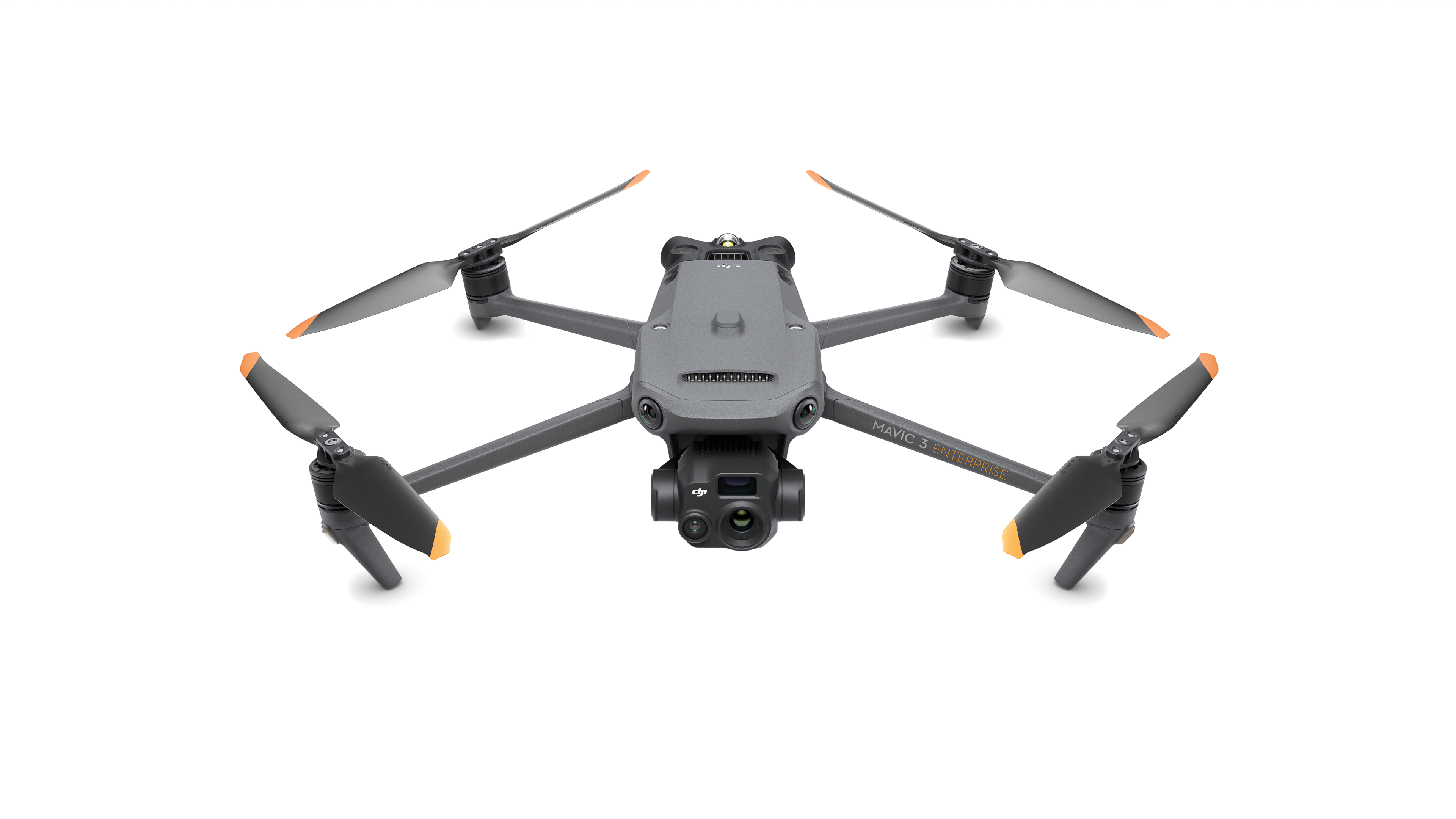 Der DJI Mavic 3 Enterprise Thermal Multikopter (M3T) von DJI Enterprise ist ein grauer Quadrocopter mit orangefarbenen Propellern, Frontkamera und Sensoren, ideal für Rettungseinsätze. (EU/C2-zertifiziert, inkl. DJI Care Basic Versicherung). Isoliert auf weißem Hintergrund.