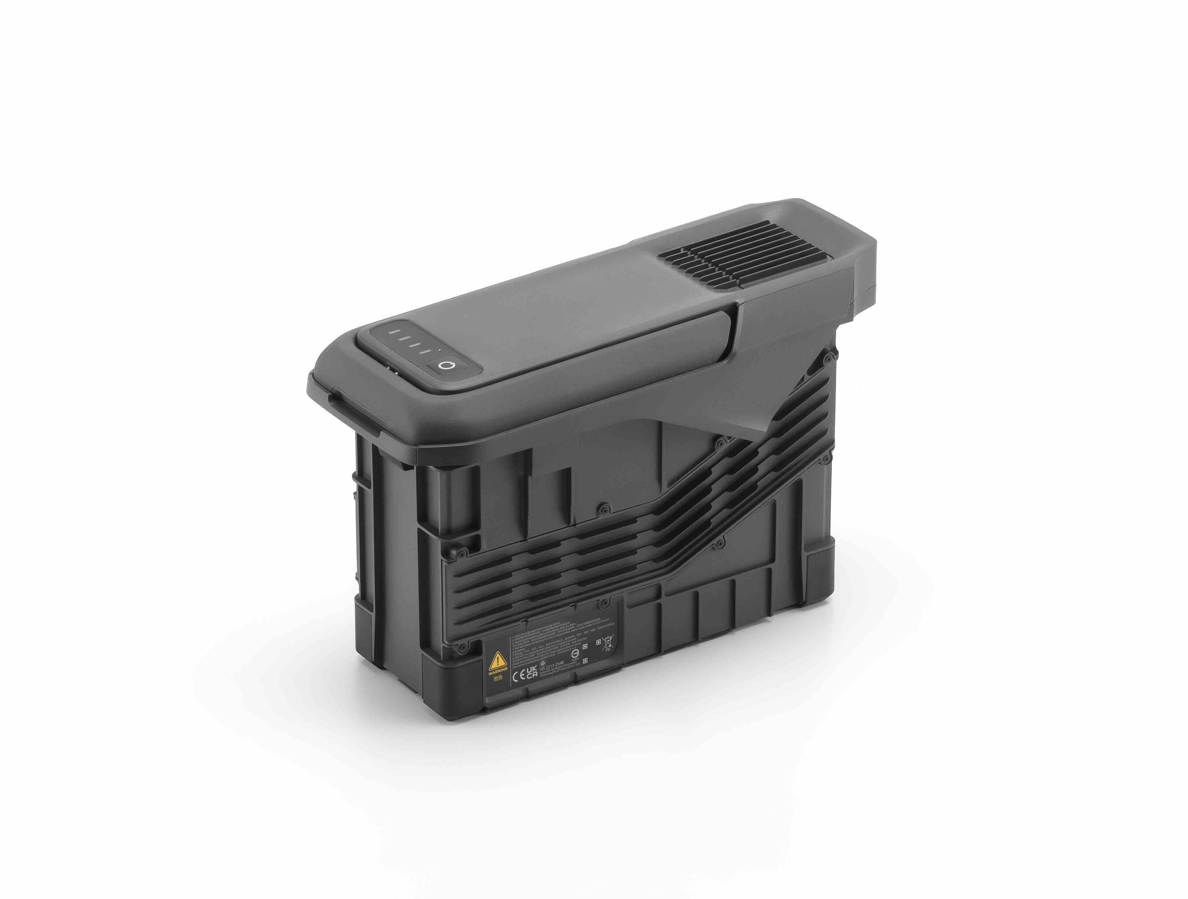 Ein schwarzer, rechteckiger DJI Enterprise Akku TB100 für DJI M400 RTK - Intelligenter Flugakku (977 Wh) mit Kontrollleuchten und Lüftungsschlitzen, dargestellt auf weißem Hintergrund.
