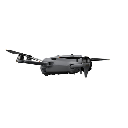 Eine graue DJI Mavic 4 Pro 512GB Creator Combo von DJI Consumer, ausgestattet mit einem 100MP Hasselblad Dreifachkamera-System und 6K HDR Video, wird im Flug mit vier Propellern und einer Frontkamera vor einem weißen Hintergrund gezeigt.